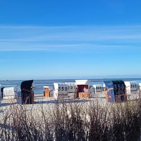 Strandkajuete Hooksiel Apartmán *